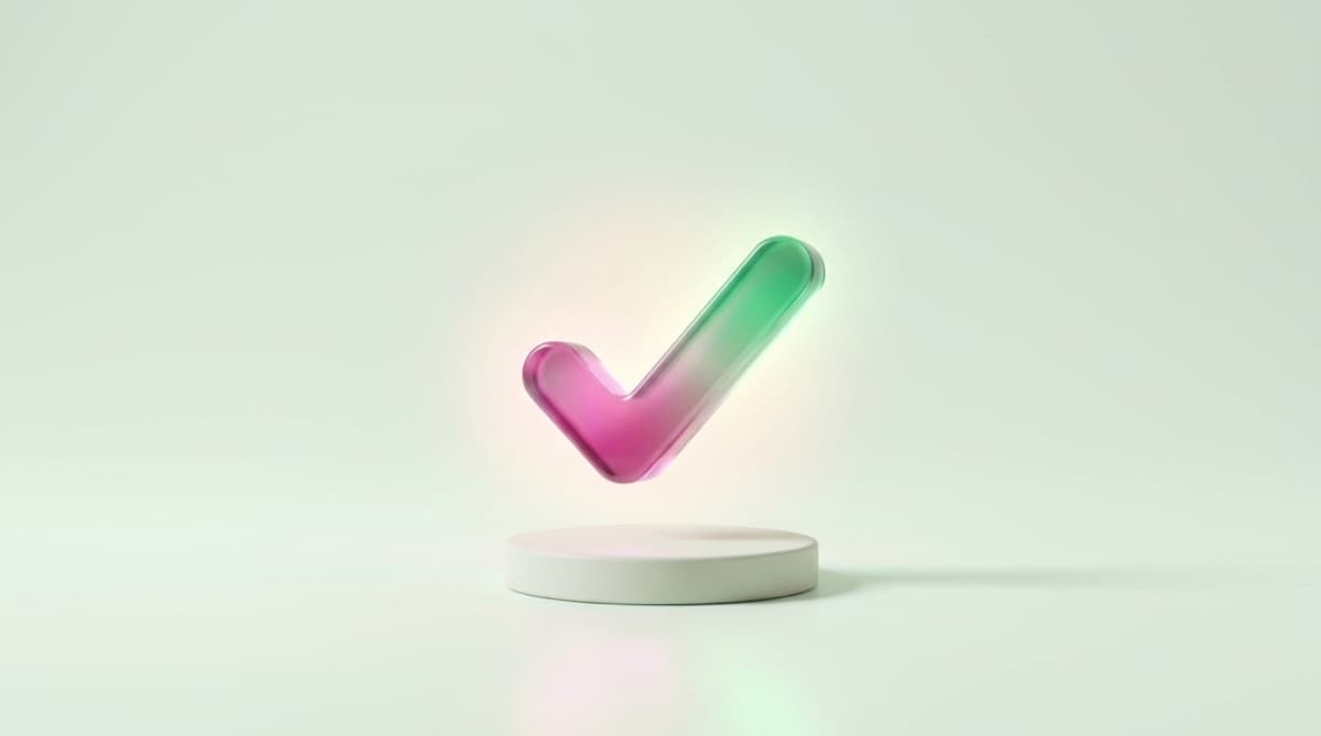 Glowing pink-to-green glass checkmark floating above a pedestal — an approved file