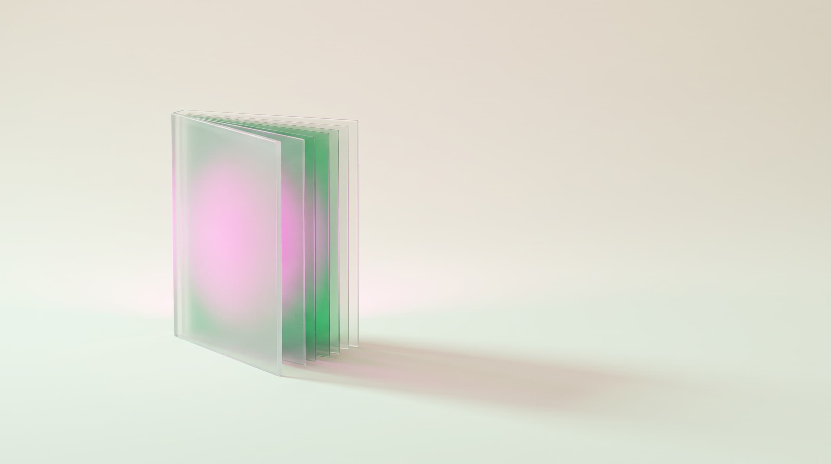 frosted-glass statement folio catching magenta-to-emerald light on mint-cream, no text